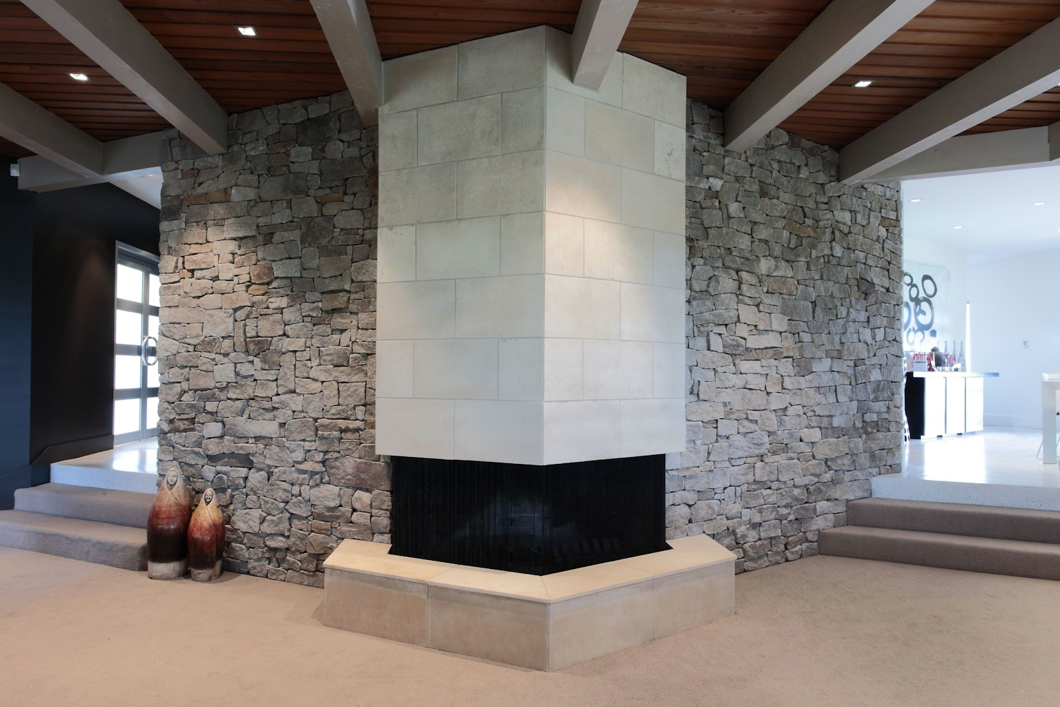 Alpine drystone wall behind fireplace